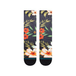 Stance - Cabana Poly Crew Socks 2023 are navy blue with a tropical floral pattern featuring orange and white flowers, green leaves, and palm fronds.