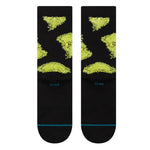 Stance Mean One Crew Sock 2025 - A black crew sock with a green and yellow abstract design on top.