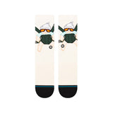 The Hangover X Stance Carlos Crew Socks 2024 - A pair of white crew socks with a cartoon graphic of a man wearing sunglasses and a hat, holding a beer bottle.