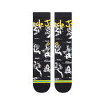 Stance Circle Jerks X Stance Crew Socks 2023 - Black crew socks with white and yellow graphics of a man playing guitar, featuring the words "Circle Jerks" in yellow at top.