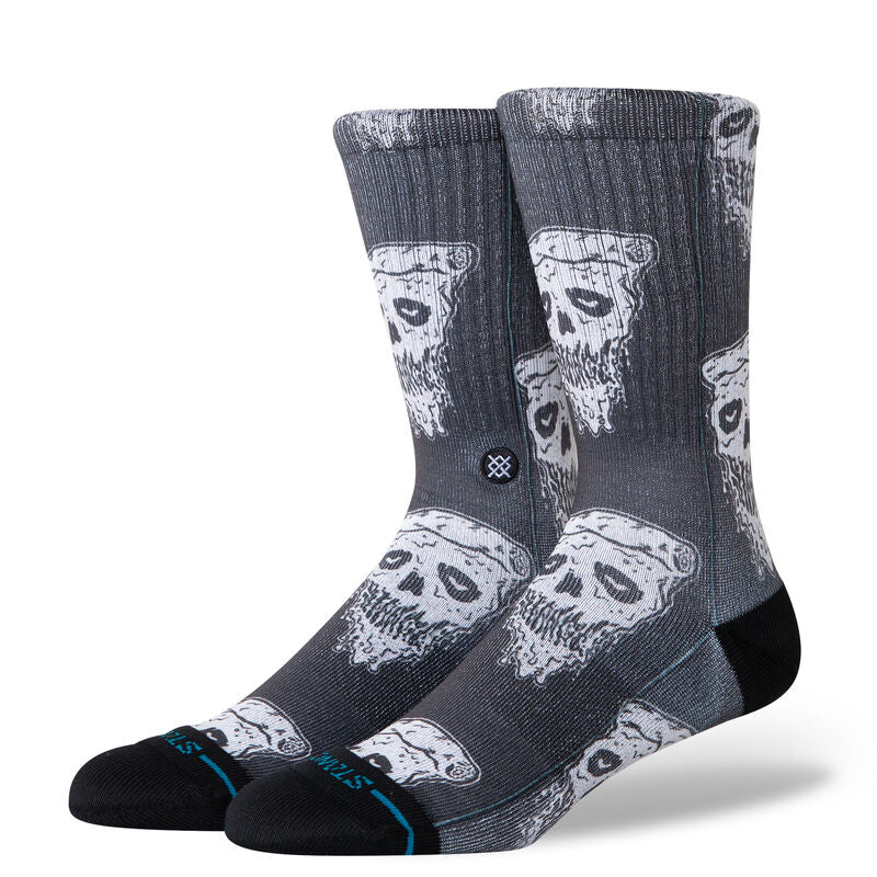 Stance Pizza Face Casual Crew Sock 2024 - A pair of crew socks with a repeating pattern of white pizza slices featuring black eyes and mouths, set against a dark gray background.