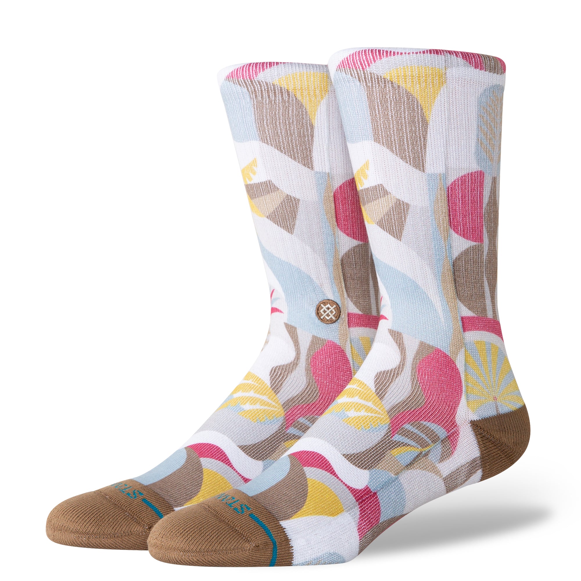 Stance Tropiclay Crew Casual Sock 2025 - A pair of crew socks with a tropical pattern in shades of pink, yellow, and brown on a white background.
