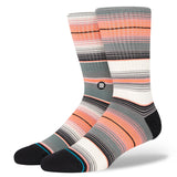 Stance Lanak Pass Snow Crew Sock 2024 - A pair of crew socks in a grey and orange plaid pattern with black accents.