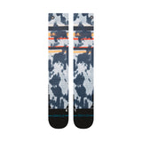 Stance Brong Snow Sock 2025 - A pair of snow socks with a light blue and white abstract pattern, featuring dark blue splotches and orange stripes.