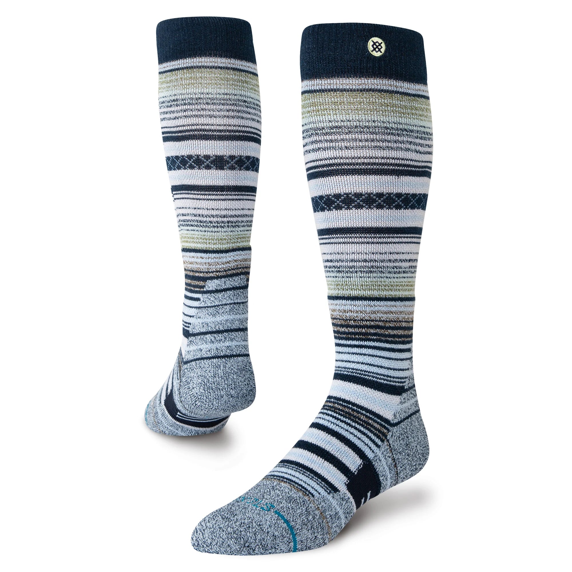 Stance Curren Snow Sock 2025 - A pair of snow socks with a light blue and white striped pattern, featuring dark gray accents at the top and heel.