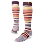Stance Curren Snow Sock 2025 - A pair of snow socks with a yellow, orange, and brown striped pattern on a white background.