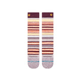 Stance Curren Snow Sock 2025 - A pair of snow socks with a predominantly white base, featuring horizontal stripes in shades of orange and brown.