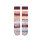 Stance Curren Snow Sock 2025 - A pair of snow socks with a predominantly white base, featuring horizontal stripes in shades of orange and yellow at the top, and thin blue lines near the toes.