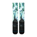 Stance Micro Dye Snow Sock 2025 - A pair of snow socks with a green and white tie-dye pattern on a light background.