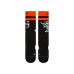 Stance - Jill Perkins signature logo in white on a black background with an orange stripe at top.