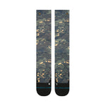 Stance Rompin Snow Sock 2025 - A pair of snow socks with a dark green and tan patterned design.