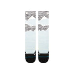 Stance Windy Peaks Snow Sock 2025 - A pair of snow socks with a light blue background and gray mountain peaks.