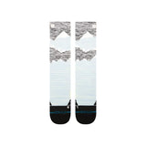 Stance Windy Peaks Snow Sock 2025 - A pair of snow socks with a light blue background and gray mountain peaks.