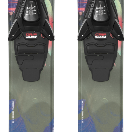 Atomic junior bent skis with multicolor graphics and visible bindings