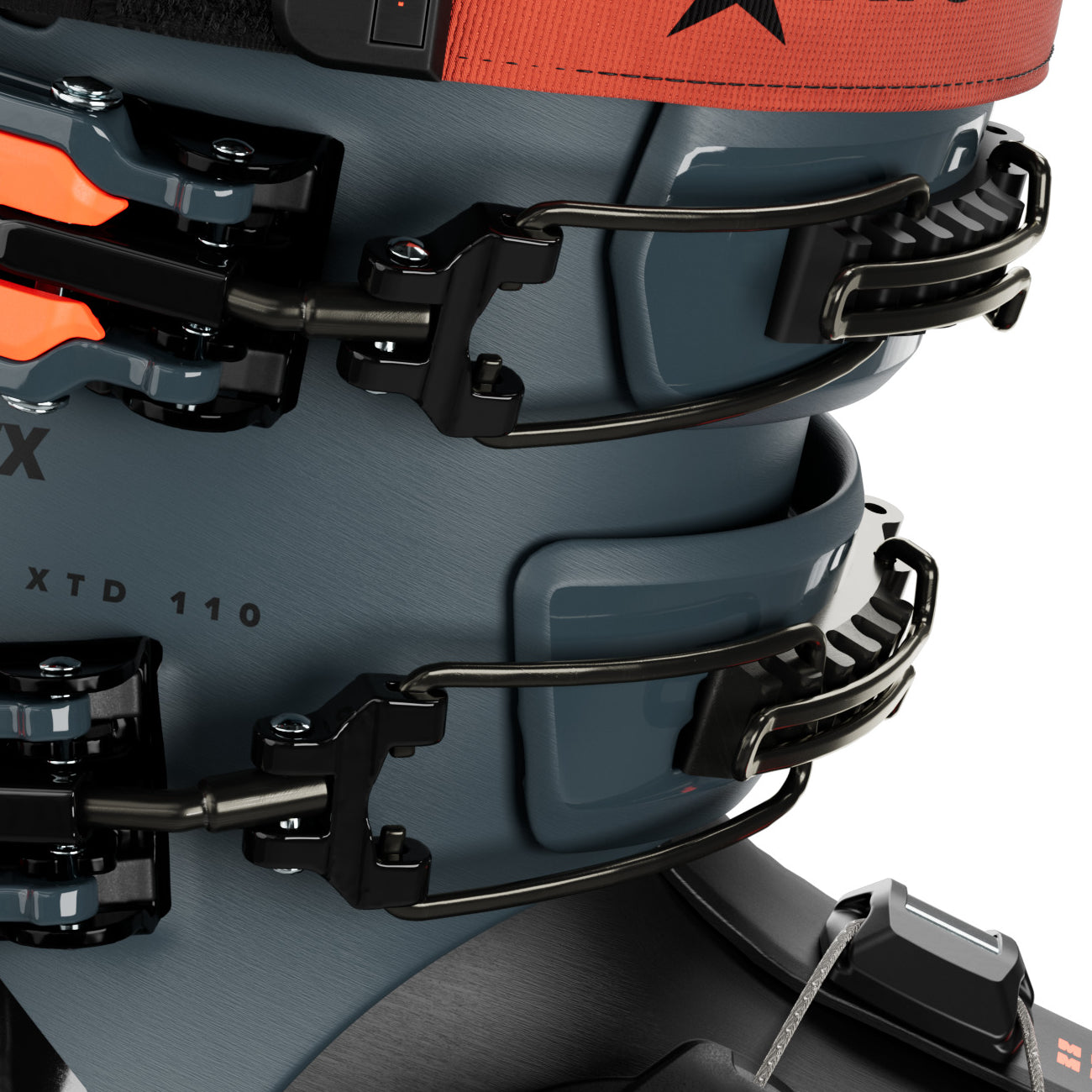 Atomic Hawx Prime XTD 110 Boa Ski Boot - A black ski boot with a red strap and silver buckles, featuring a textured pattern on the toe cap.