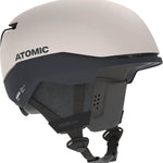 Atomic Four Amid Helmet 2025 - A white helmet with a black chin strap and a gray logo on the side.