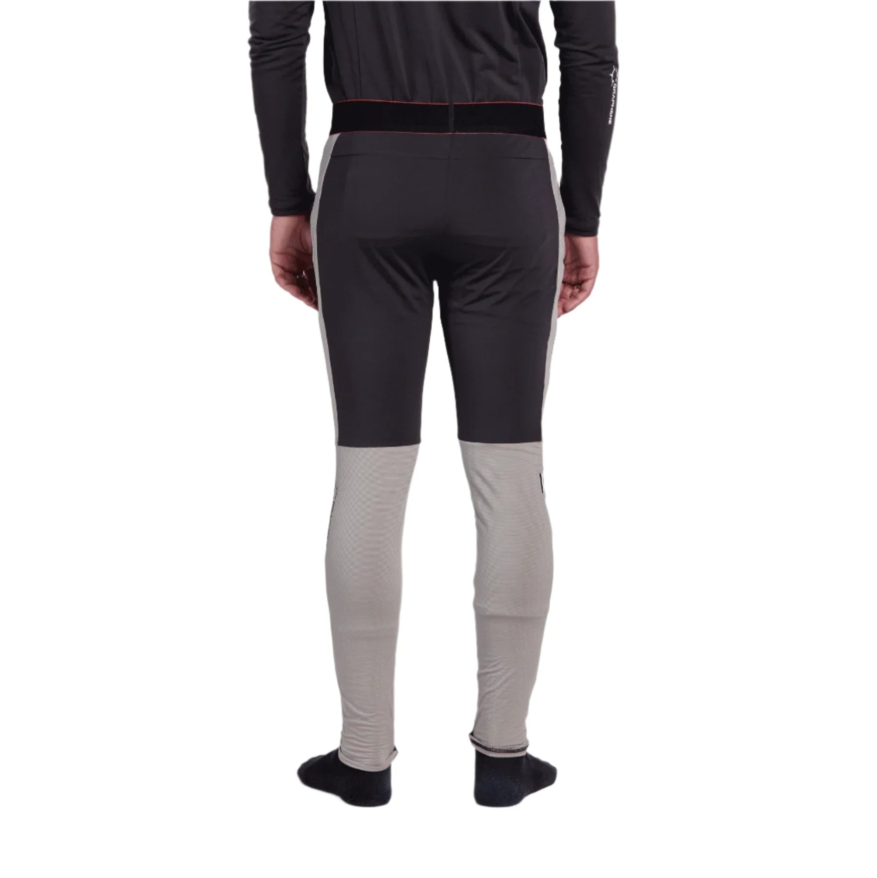 Whitespace Graphene Midweight Base Layer Bottom 2024 - A pair of black base layer bottoms with a subtle white stripe down the side.