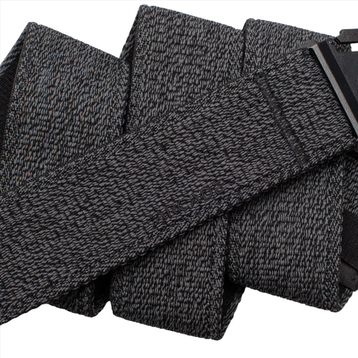 Close-up of a heather black belt showing the textured fabric and the brand name 'ARCADE' embossed on it.