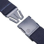 Close-up of the navy blue belt buckle, showing the two parts of the buckle separated. The brand name 'ARCADE' is visible on the buckle.