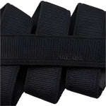 Arcade Atlas Stretch Belt Slim 2025 - Black stretch belt with a textured weave pattern and elasticated ends.