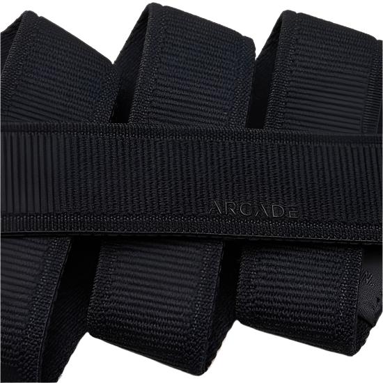 Arcade Atlas Stretch Belt Slim 2025 - Black stretch belt with a textured weave pattern and elasticated ends.