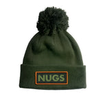 VICE POM BEANIE 2024 - A dark green beanie with a large pom-pom on top.