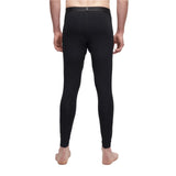 Le Bent Core Lightweight Bottom Base Layer 2025 - A pair of black base layer bottoms with a thin elastic waistband and a small white logo on the left hip.
