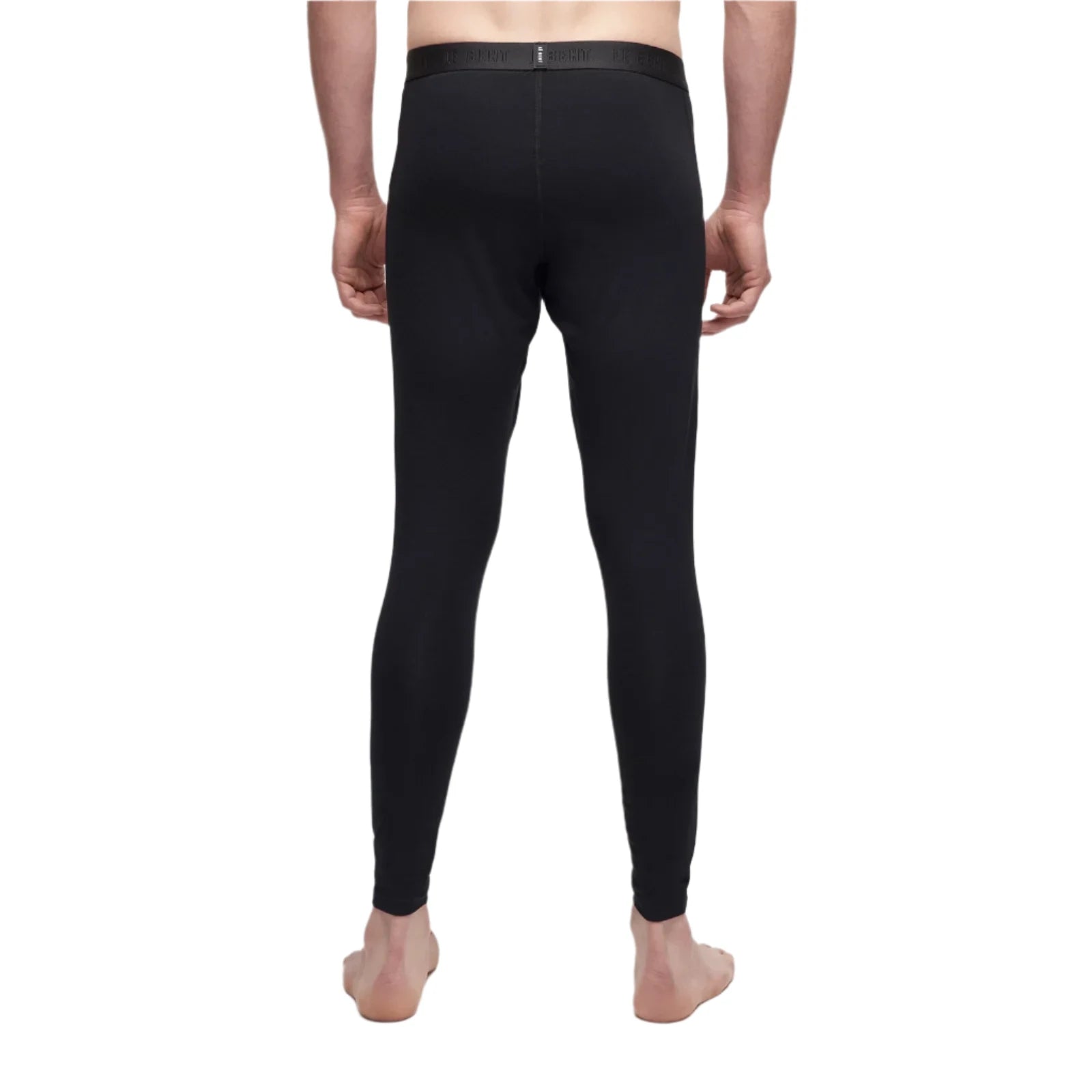 Le Bent Core Lightweight Bottom Base Layer 2025 - A pair of black base layer bottoms with a thin elastic waistband and a small white logo on the left hip.