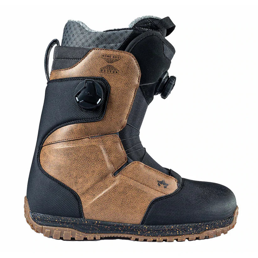 Rome Bodega BOA Snowboard Boot 2022 - A black snowboard boot with brown accents and a speckled sole, featuring a side view of the front of the boot.