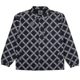 Airblaster Bruiser Shell Jacket 2025 - Black jacket with white geometric pattern and diagonal lines.