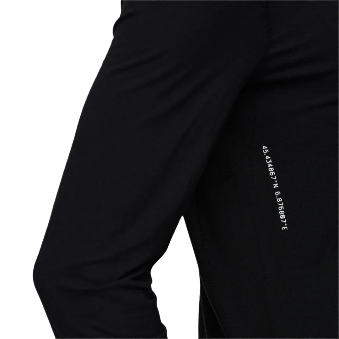 Le Bent Core Lightweight Crew Top Base Layer 2025 - A black crew-neck top with a white logo on the left chest and a small tag on the bottom hem.
