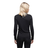 Le Bent Women's Core Lightweight Crew Top Base Layer 2025 - A black crew-neck top with a small white logo on the upper back.