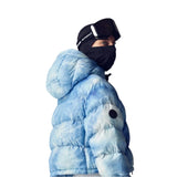 Whitespace Women's Cropped Puffer Jacket 2024 - A cropped-length puffer jacket in a light blue and white tie-dye pattern.