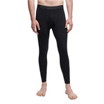 Le Bent Core Lightweight Bottom Base Layer 2025 - A pair of black base layer bottoms with a wide waistband and a small logo on the left hip.