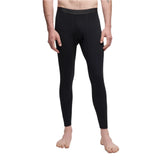 Le Bent Core Lightweight Bottom Base Layer 2025 - A pair of black base layer bottoms with a wide waistband and a small logo on the left hip.