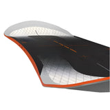 Bataleon Evil Twin - A black snowboard with a white top sheet and orange accents, featuring a grid pattern on its base.