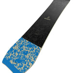 Bataleon Whatever Snowboard 2025 - A black snowboard with a blue and tan abstract pattern on the tail.
