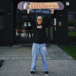 CAPiTA Big Nice Burgundy Snowboard 2025 - A burgundy snowboard with a white logo and text on top of it.