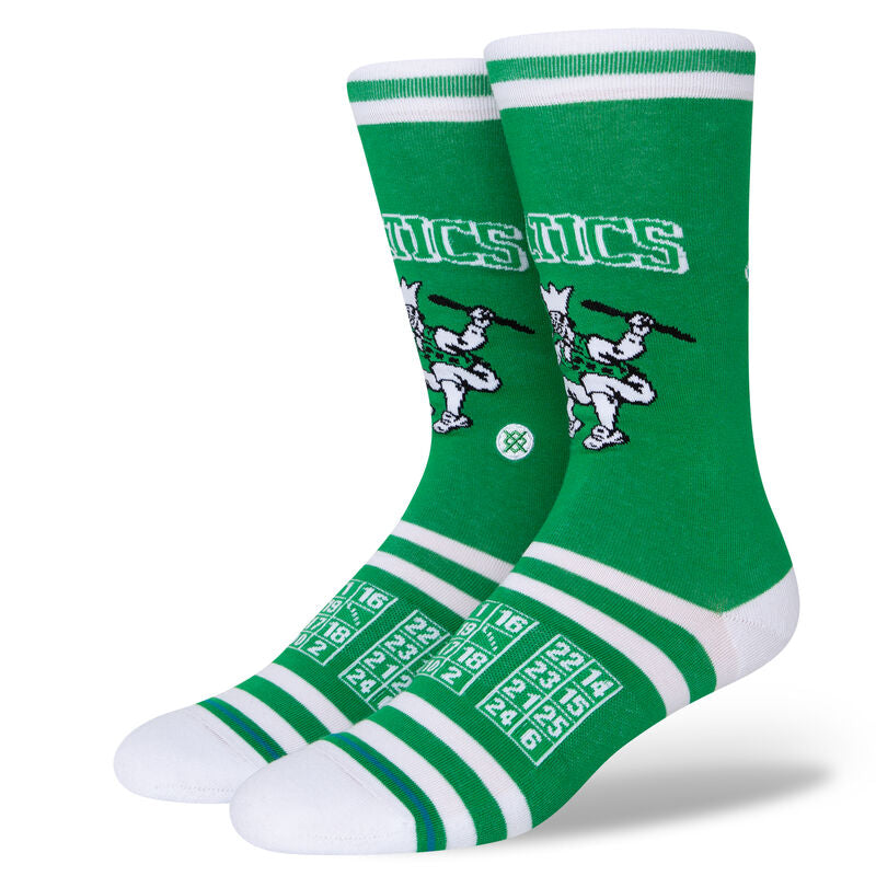 ROASTED C SOCK 2022 - A pair of green socks with a white "C" logo on the top and a small white tag that reads "Roasted".