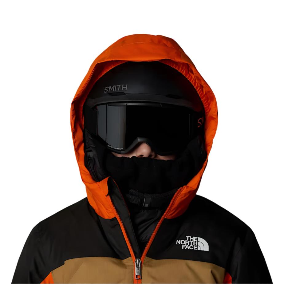 North Face Boys' Freedom Insulated Jacket 2025 - A black and orange jacket with a white logo on the left chest.