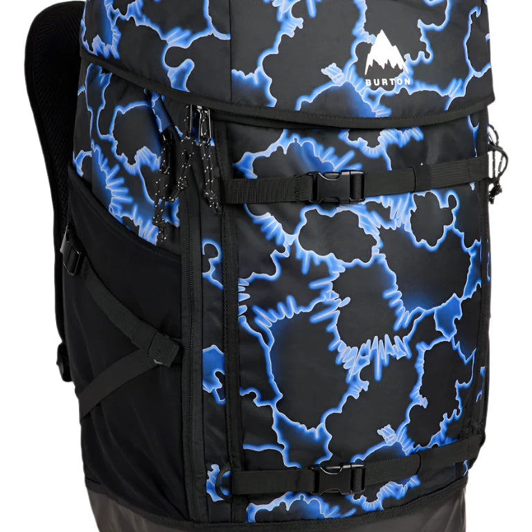 Burton Gig Boot 48L Pack 2025 - A black backpack with blue and white abstract pattern, featuring a zippered front pocket and adjustable straps.