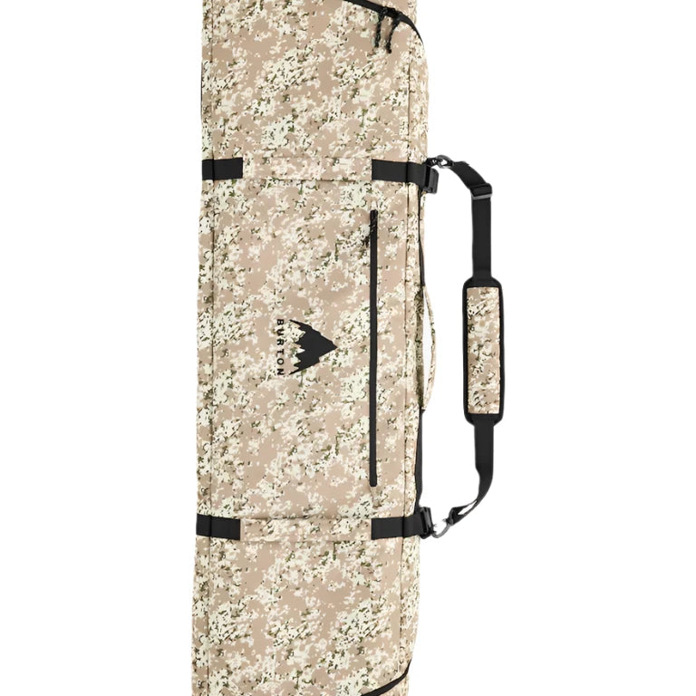 Burton Gig Snowboard Bag - A tan snowboard bag with a black strap handle and zippered pocket on front.