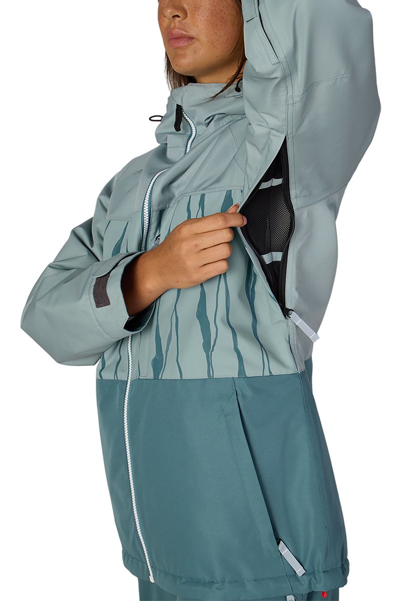 Women's insulated ski jacket, teal, side zipper close-up with hood and pocket detail