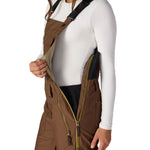 Women’s insulated brown bib overalls with side zipper opening and contrast inner panel.