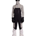 Whitespace 2L Cargo Insulated Bib Pants 2024 - Black bib pants with cargo pockets on each thigh and a black zipper down the front.