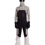 Whitespace 2L Cargo Insulated Bib Pants 2024 - Black bib pants with cargo pockets on each thigh and a black zipper down the front.