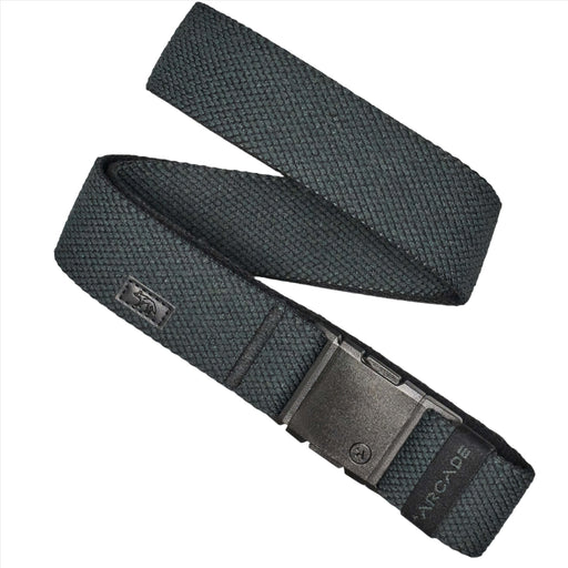 A dark green belt with a textured pattern, featuring a black buckle. The belt has a small leather patch near the buckle with the brand name "ARCADE." It is arranged neatly with the buckle prominently displayed.