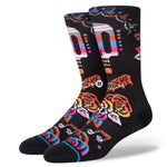 Remember Me Kids C Sock 2022 - A pair of black socks with a colorful, pixelated design featuring cartoon characters and words in pink, blue, orange, white, and yellow.