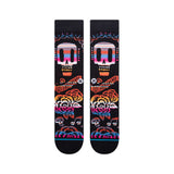 Remember Me Kids C Sock 2022 - A pair of black socks with a colorful striped pattern and a repeating "REMEMBER ME" logo in pink, blue, orange, and white.