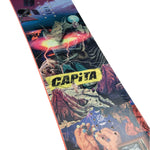 CAPiTA - Junior's Children Of The Gnar Snowboard 2025 is shown from a top-down perspective, featuring a predominantly black background with neon green accents and graphics of a skeleton riding a snowboard.
